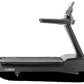 Black motorized treadmill with digital display console and adjustable running deck on white background