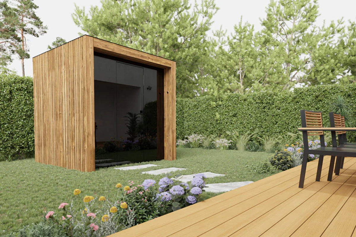 Modern wooden outdoor sauna with vertical slat exterior and dark glass doors in garden setting