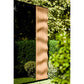 Thermasol Ombra outdoor sauna with natural wood vertical slat design in garden setting surrounded by green foliage