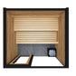 Thermasol Spectra outdoor sauna with natural wood interior, slatted seating, gray stone backrest, and white stones in black c