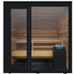 Thermasol Spectra outdoor sauna with black frame, glass doors, cedar wood interior benches, and black bucket with stones