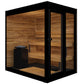 Black framed outdoor sauna with cedar wood interior, glass doors, and black heater stove on white background