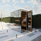 Modern outdoor sauna with wood interior, glass doors, and black metal frame in snowy winter setting