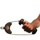 Hand holding black rotating cable handle with gray cord attached on white background