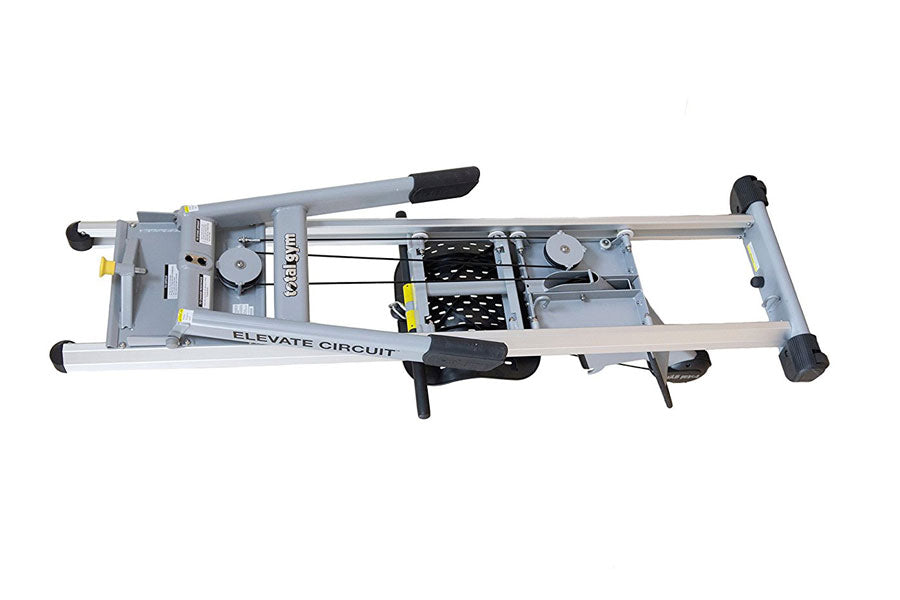Elevate Circuit Total Gym Row Trainer with gray aluminum frame, black foot pedals, and black grip handle on white background