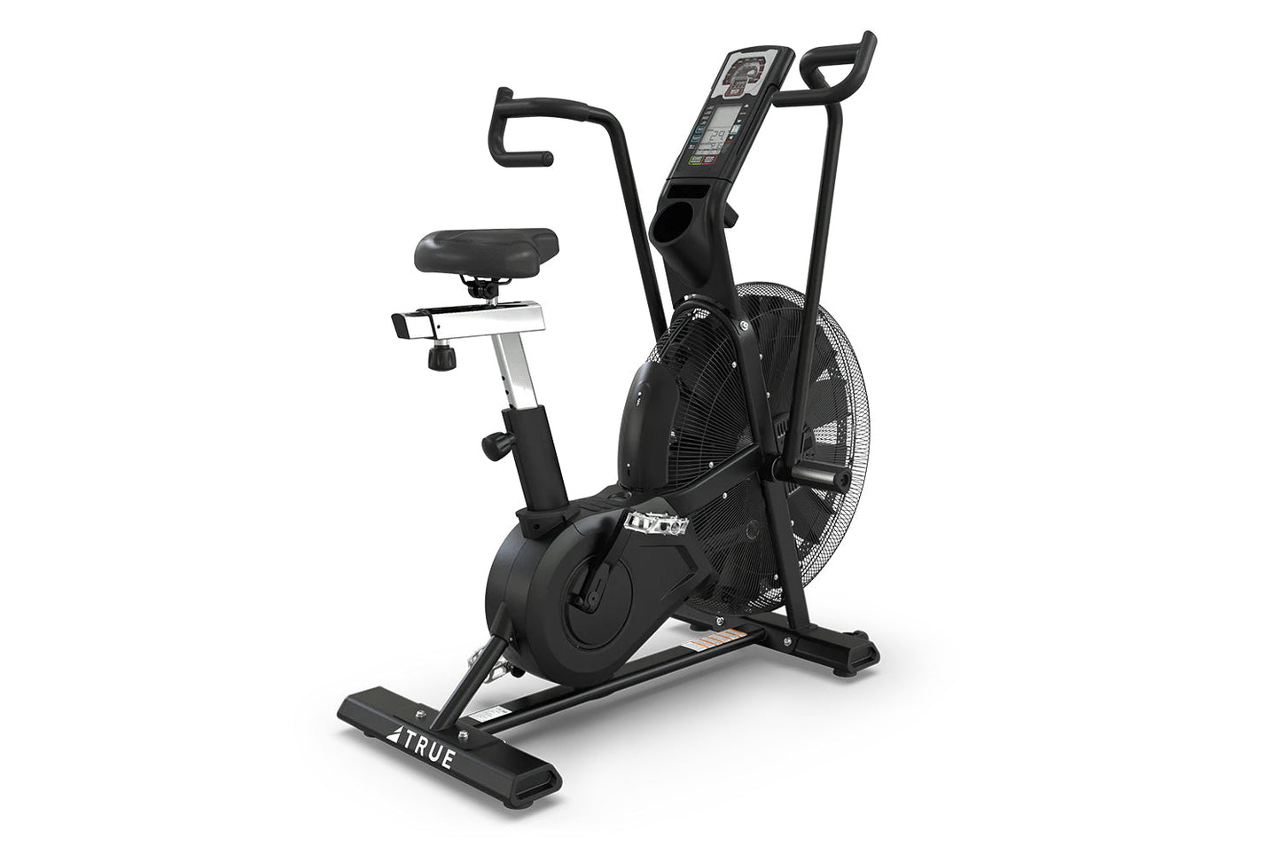 Black TRUE ADX exercise air bike with large fan wheel, digital display console, curved handlebars, black cushioned seat, and 