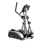 TRUE M30 elliptical machine with black and silver frame, digital console, and foot pedals on white background