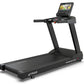 Black TRUE Performance 1000 treadmill with digital display console, handrails, and wide running belt on white background