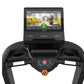 Black TRUE Performance 1000 treadmill with touchscreen console displaying fitness app interface and dual handlebar controls w