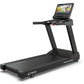 Black True Performance 1000 treadmill with digital display console showing workout content on white background