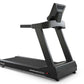 TRUE Performance 3000 black treadmill with digital display console and fan mounted on top, on white background