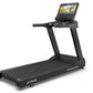 Black TRUE Performance 3000 treadmill with digital touchscreen display, control console, and wide running deck on white backg