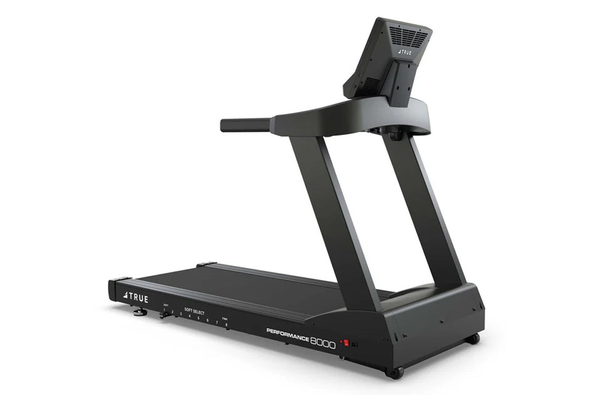 True Performance 8000 black treadmill with digital console and soft select incline controls on white background