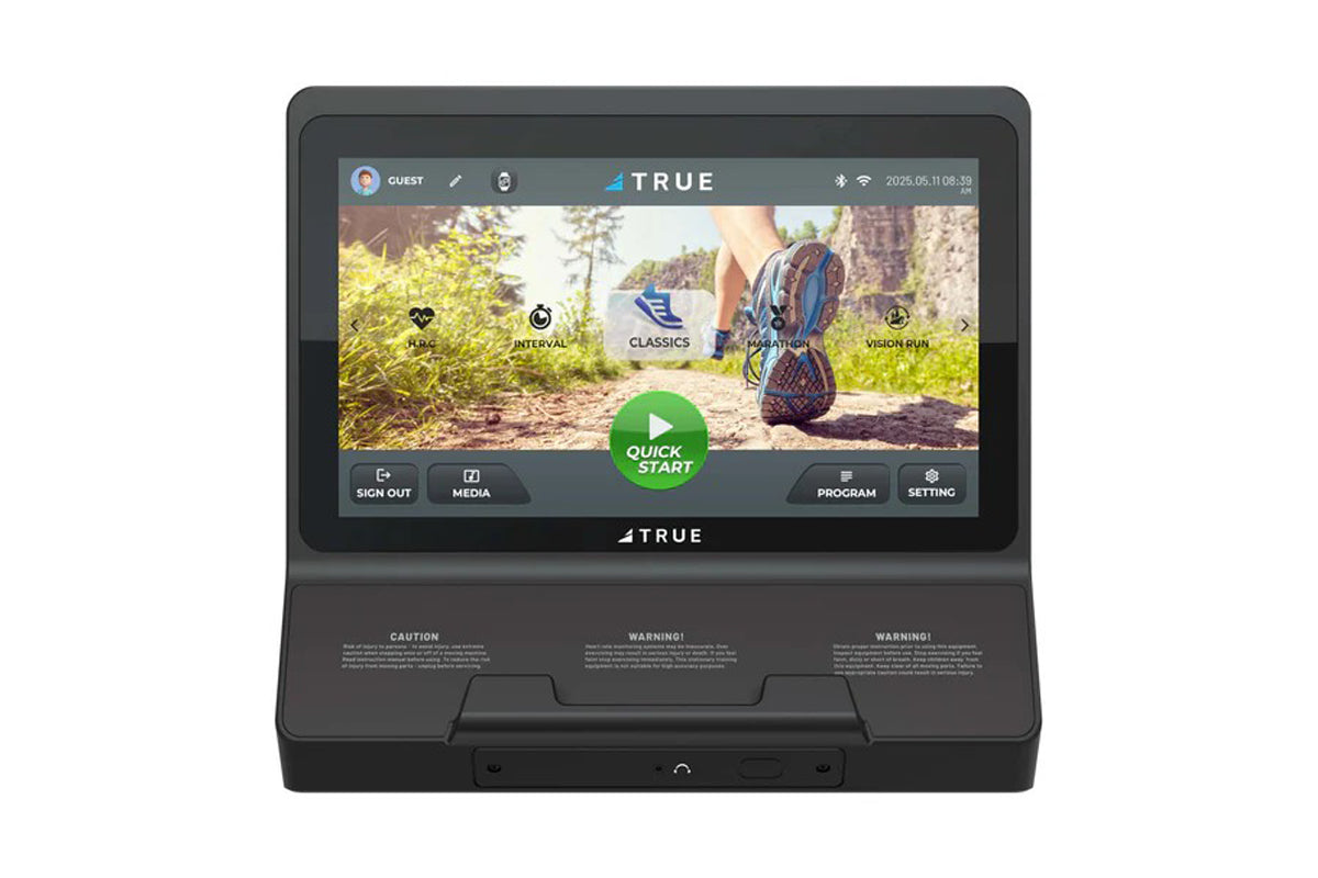 TRUE Performance 8000 treadmill display console showing running app interface with trail running scene and quick start button