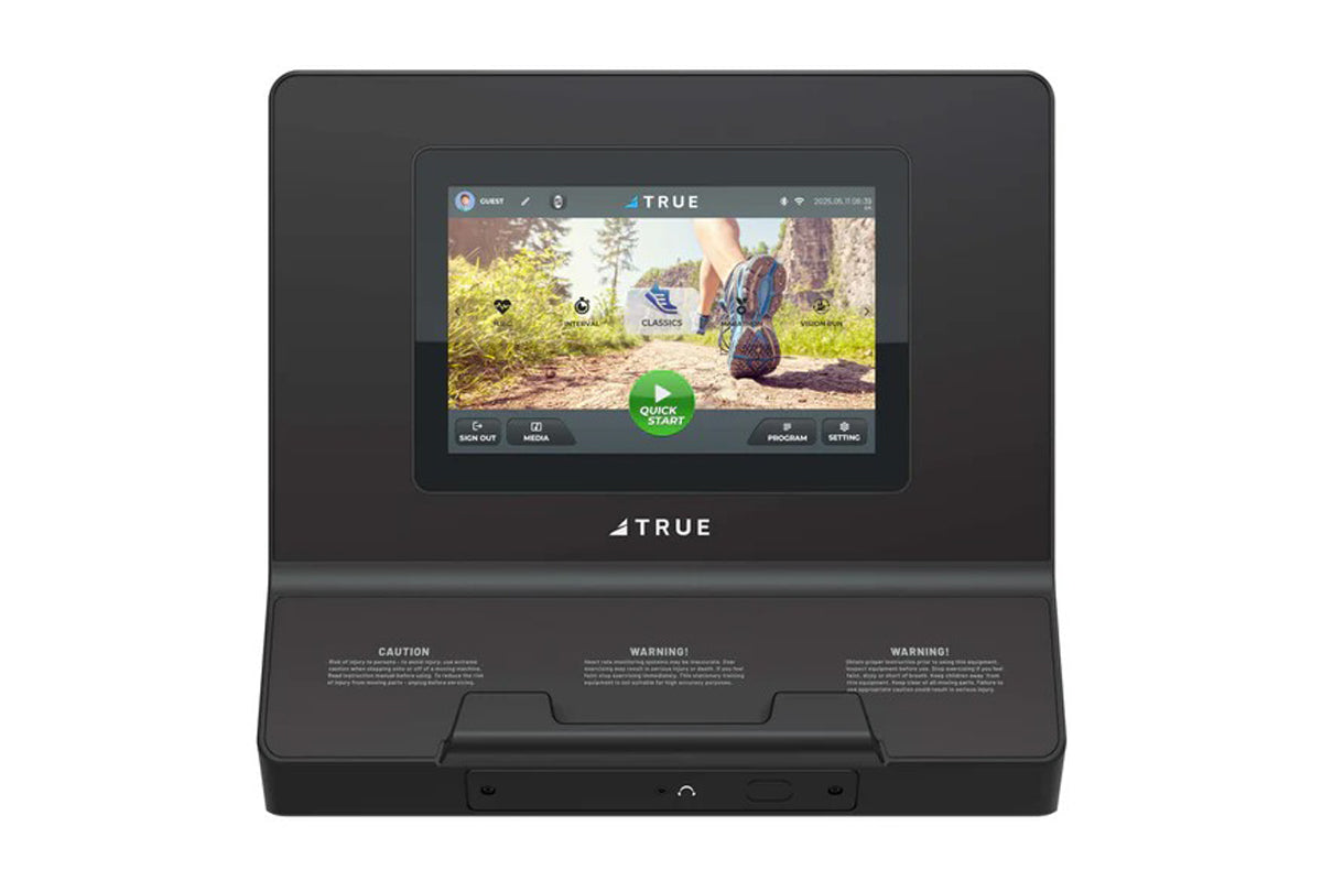 True Performance 8000 treadmill with black base and built-in touchscreen display showing fitness app interface, on white back