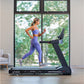 Woman in purple sports bra and leggings running on black TRUE Performance 8000 treadmill in modern room with large windows ov