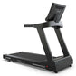 TRUE Performance 8000 black treadmill with digital console, gray handrails, and control panel on white background
