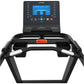 TRUE Z500 treadmill with black frame, silver handlebar grips, and blue digital display screen showing cardio challenge metric