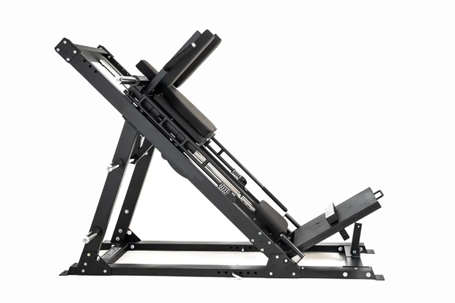 Black leg press and hack squat machine with adjustable foot plate and angled frame on white background