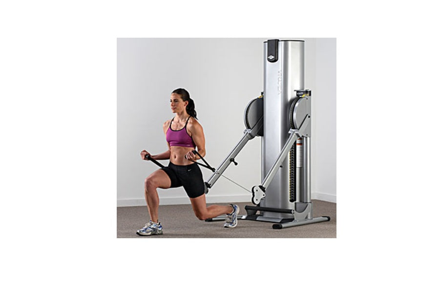 Woman using silver and black Vectra Fitness functional trainer with dual cable stacks, wearing purple sports bra and black sh