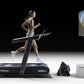 Female runner on black Wahoo KICKR RUN smart treadmill with display screen showing cityscape, against black background