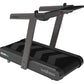 Wahoo Kickr Run smart treadmill with dark gray frame, black belt, dual handles, and blue accent logo on white background