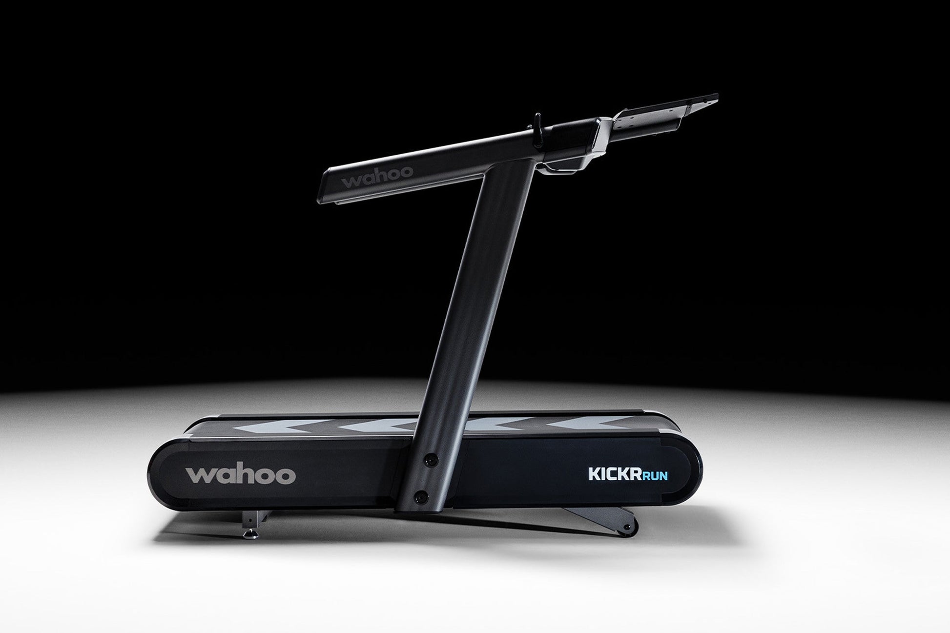 Wahoo KICKR Run smart treadmill with black frame and digital display on white background