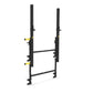 Black steel wall-mounted squat rack with yellow adjustment pins and horizontal safety bars on white background