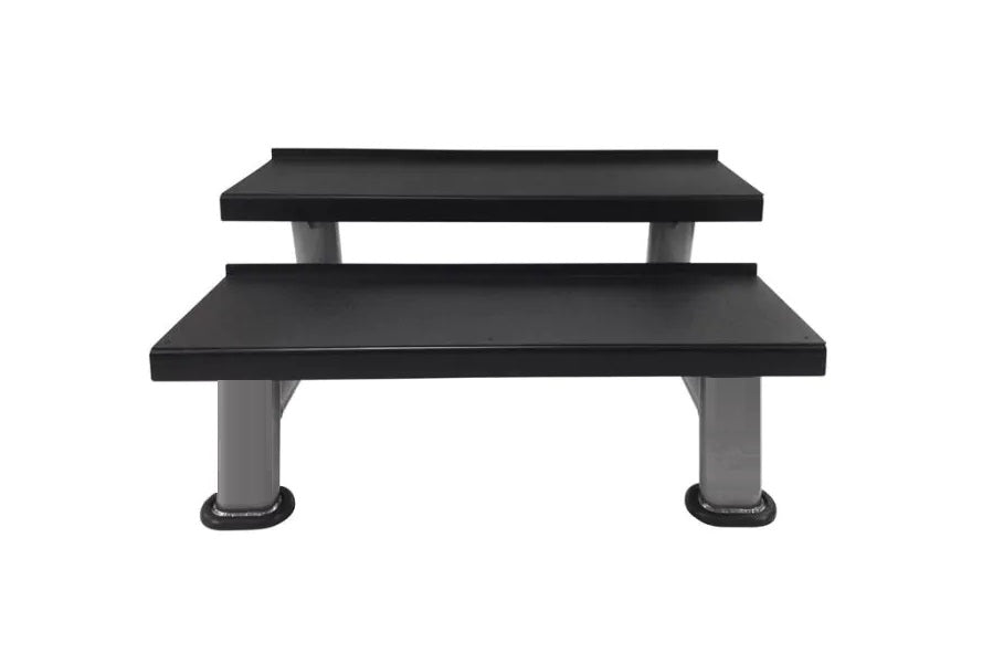 Two-tier black kettlebell rack with gray cylindrical supports on white background
