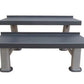 Two-tier commercial kettlebell rack with gray shelves and white cylindrical support legs on white background