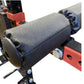 Warrior 2.0 cable crossover pulley system with textured black and gray cylindrical weights, red metal frame, and blue adjustm