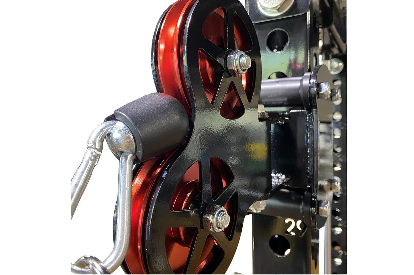 Warrior 3.0 Cable Crossover Pulley System with red and black dual pulleys, metal frame, and chrome handles