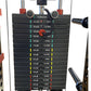 Black weight plate storage system with stacked plates labeled 10lb to 170lb, color-coded bands in green, yellow and red, moun