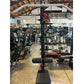 Warrior 3.0 cable crossover pulley power rack with lat pulldown and red accents in gym setting surrounded by fitness equipmen
