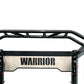 Black steel cable crossover pulley power rack with "Warrior" branding on silver nameplate, red indicator lights, and overhead