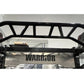 Black steel cable crossover power rack with integrated lat pulldown station and stainless steel nameplate, displayed in gym s