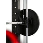 Warrior 3.5 cable crossover pulley power rack with black weight plate loaded on chrome barbell, shown from side angle