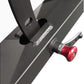 Black metal weight bench frame with red adjustment knob and mounting holes, flat lay on white background
