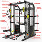 Black and gray metal power rack with yellow weight stacks, pull-up bar, cable crossover system, and integrated Smith machine 