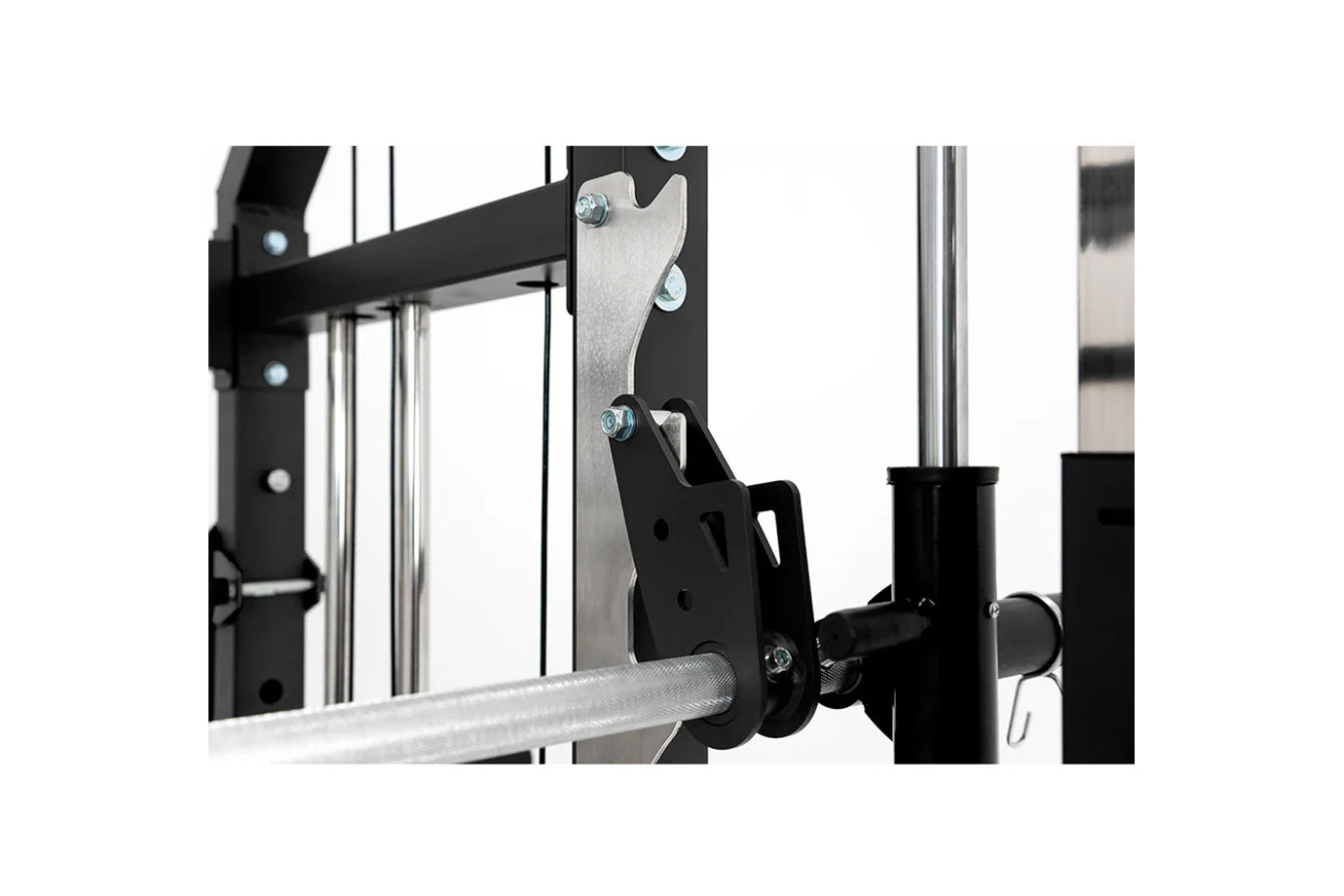 Warrior 701 all-in-one power rack with black steel frame, silver metal attachment plates, chrome vertical rods, and cable pul