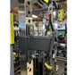 Warrior 701 power rack with cable crossover system, featuring black and yellow metal frame with adjustable pulleys and weight