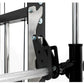 Black and silver cable machine attachment detail showing metal bracket, adjustment knob, and pulley system on white backgroun