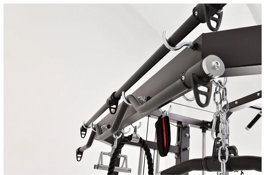 Warrior 801 Pro power rack with gray and black metal frame, cable pulleys, and chain attachments on white background