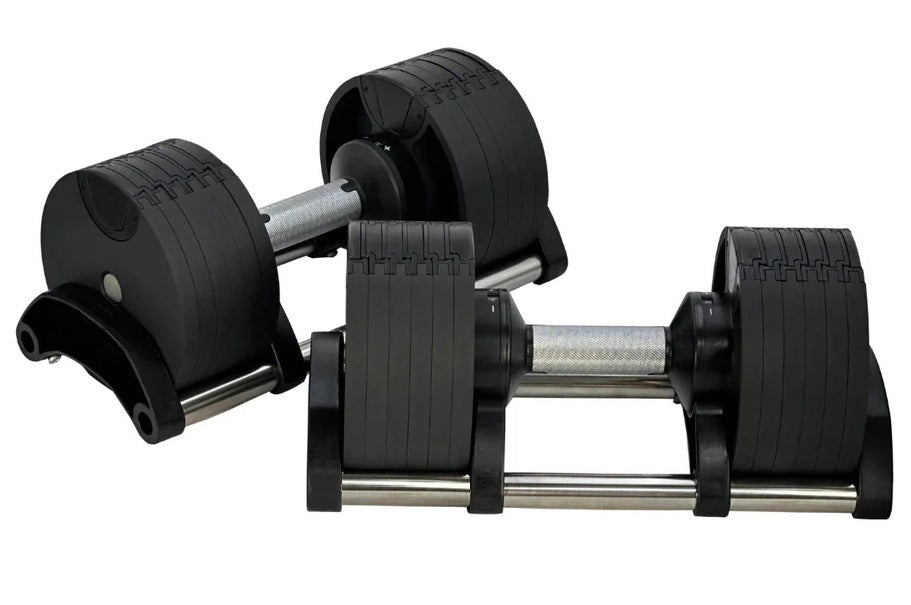 Pair of black adjustable dumbbells with metal handles and weight plates, shown in flat lay on white background