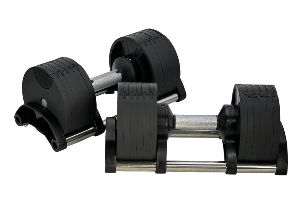 Pair of black rubber-coated adjustable dumbbells with metal handles and ridged weight plates on white background