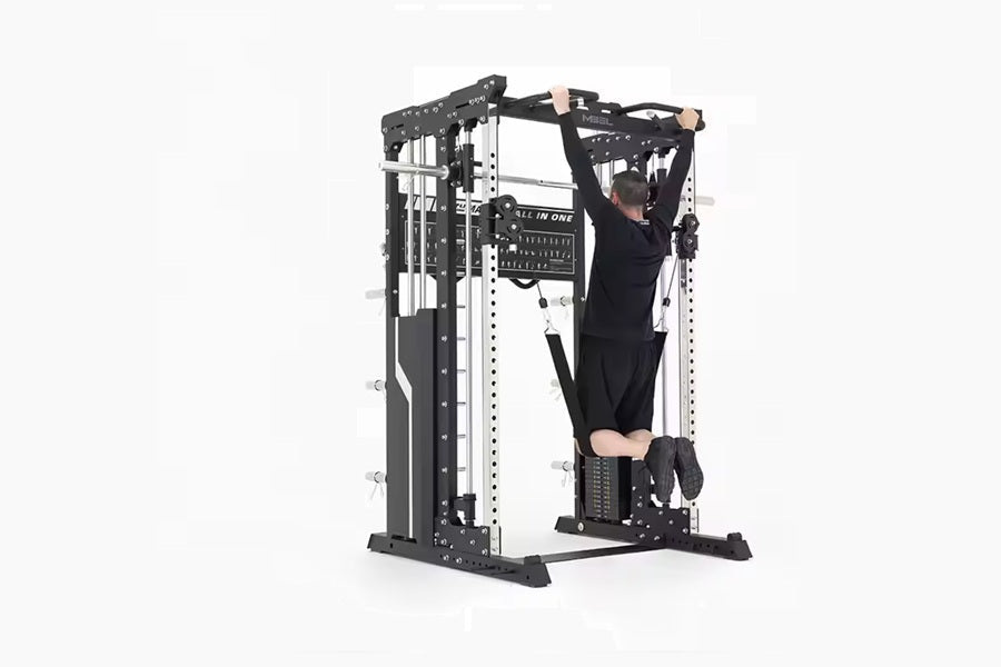 Black and white multi-function power rack with cable pulley system and Smith machine, model shown with person performing exer