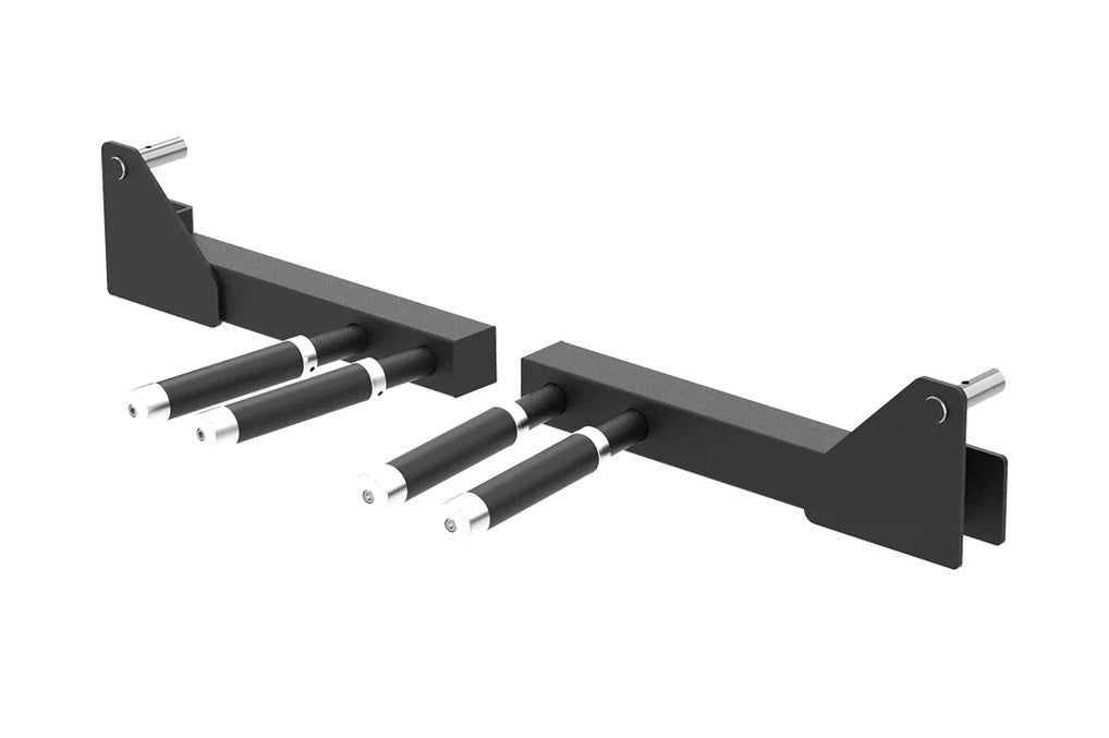 Black steel cable pulley system with four black handles and silver metal pins, flat lay on white background