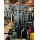 Warrior 901 black all-in-one power rack with cable pulleys, smith machine, and counter-balanced system in gym setting