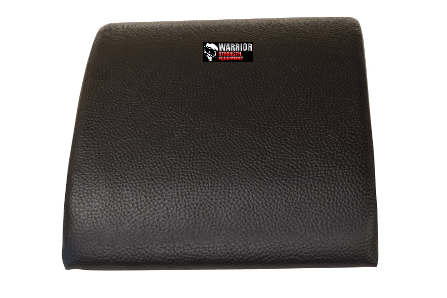 Black textured ab mat with Warrior Equipment logo, curved padded surface for abdominal exercises on white background