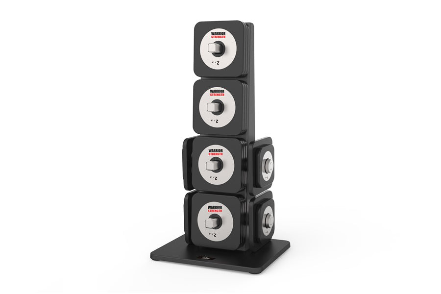 Four-tier black dumbbell rack with stacked adjustable weight plates, each featuring silver dials and Warrior branding, on bla